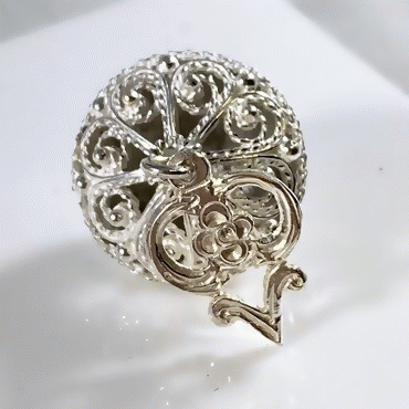 Charcoal button with small pendant